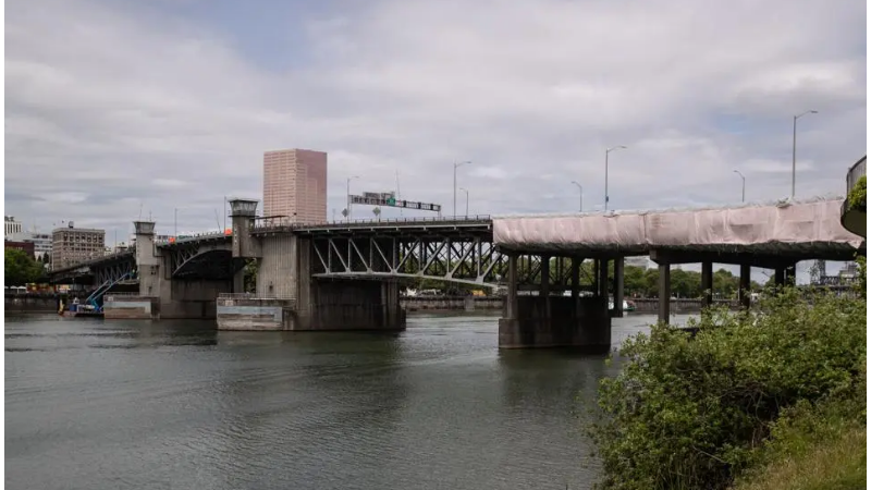 Body was discovered drifting in the Willamette River close to Morrison Bridge