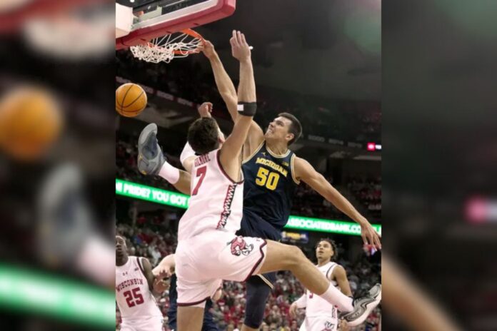 Michigan's Big Ten Triumph How Two 7-Footers Led the Wolverines to a Nail-Biting Victory Over Wisconsin Michigan's Big Ten Triumph: How Two 7-Footers Led the Wolverines to a Nail-Biting Victory Over Wisconsin